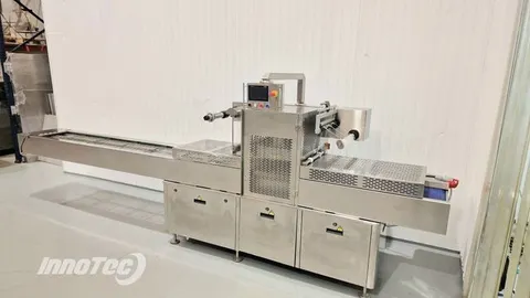 Termoselladora automática Promens 1751VG para envases - Ocasión revisada
